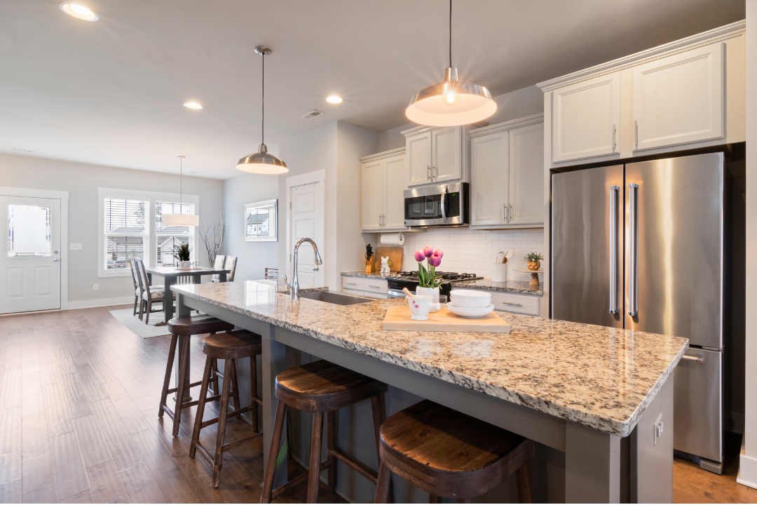 A spotless open-plan kitchen and living area in a Salt Lake City home