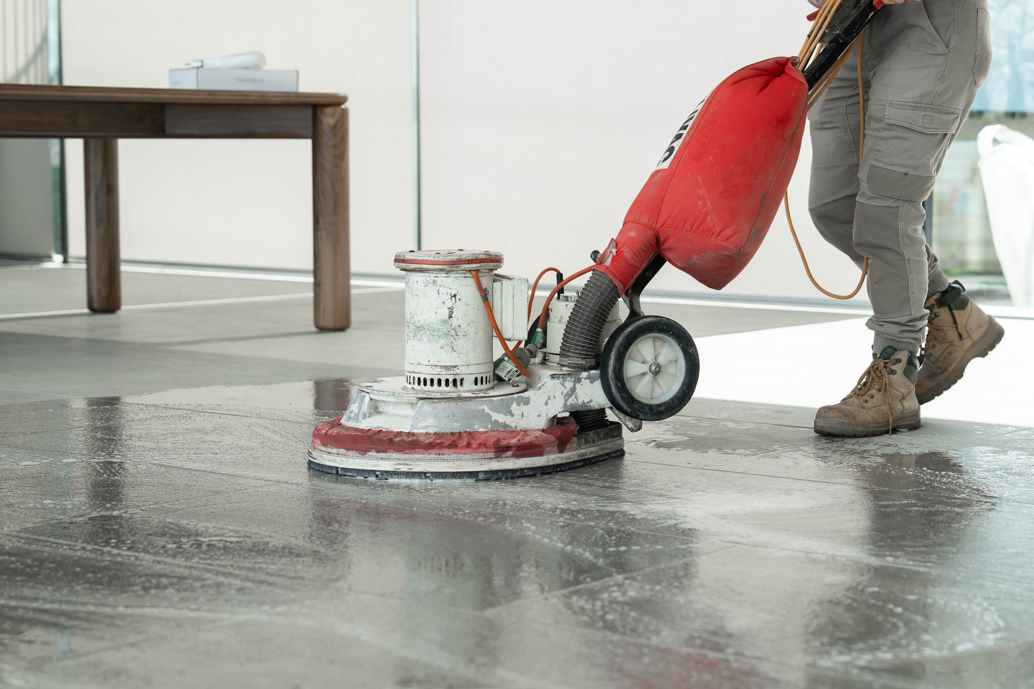 A floor cleaning machine during post-construction cleanup